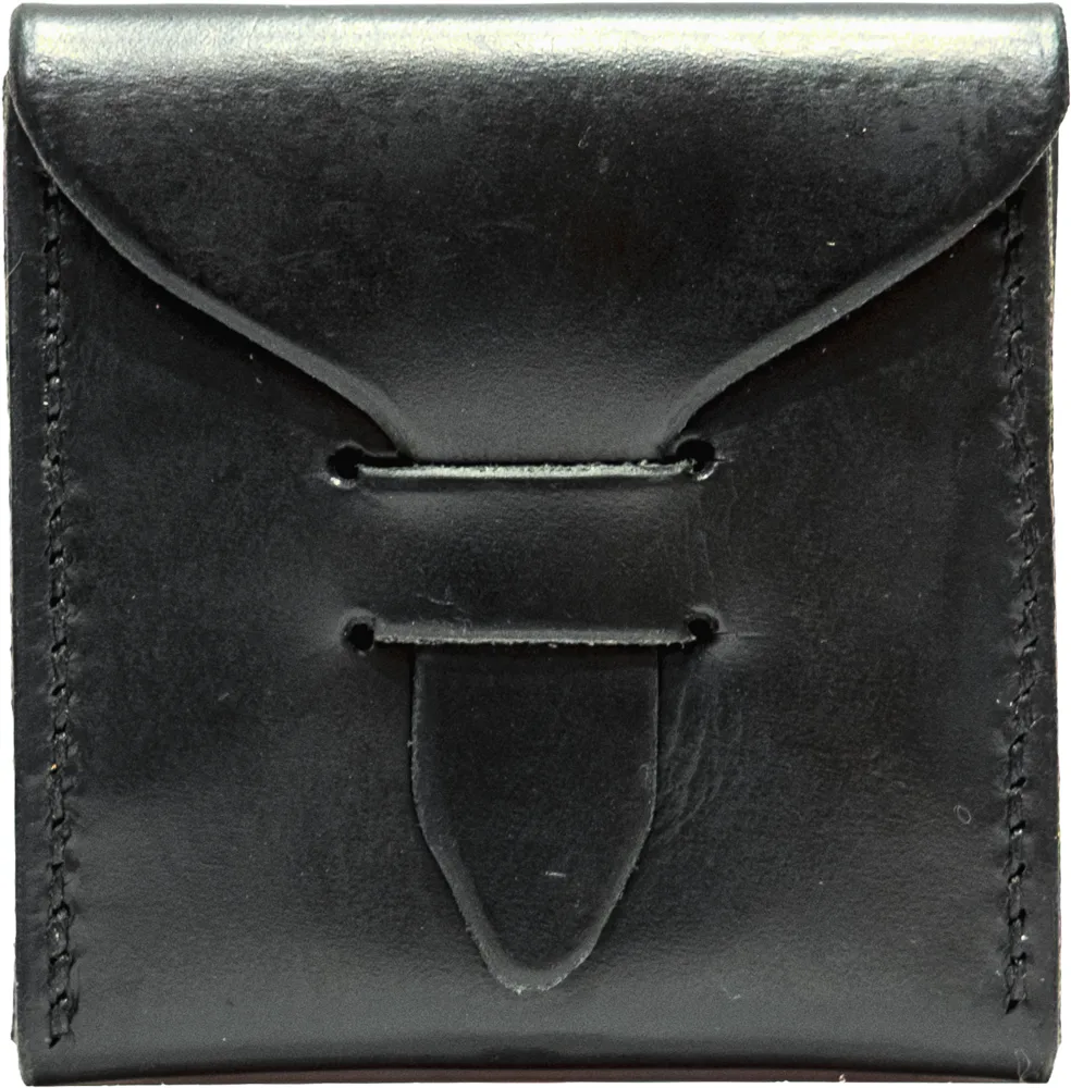 Black Chromexcel pick case, closed. Glossy oiled leather with a soft sheen across the flap.